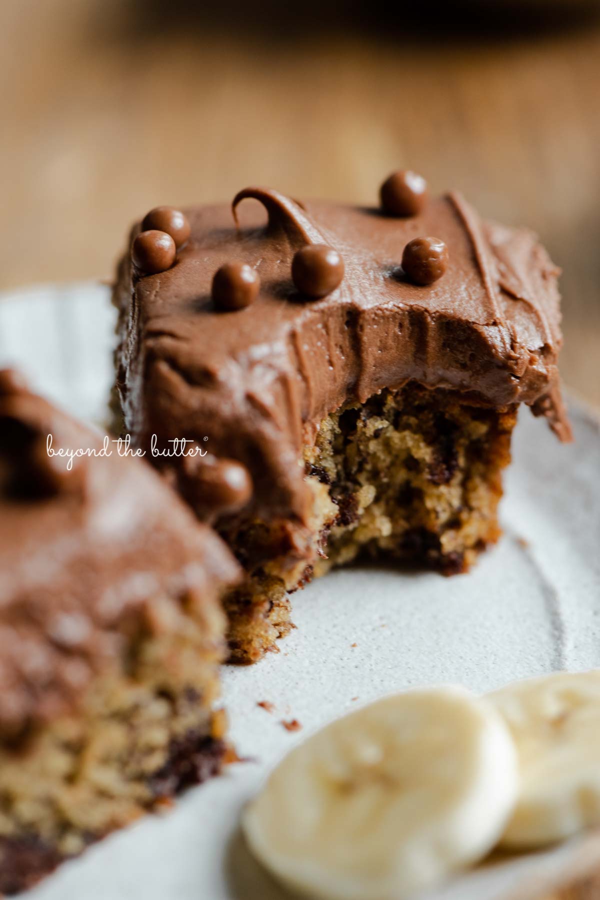 Dessert plate with half eaten slices of banana snack cake | All images © Luyiz®