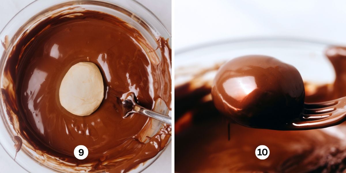 Dipping peanut butter eggs using forks into melted chocolate in a glass bowl.