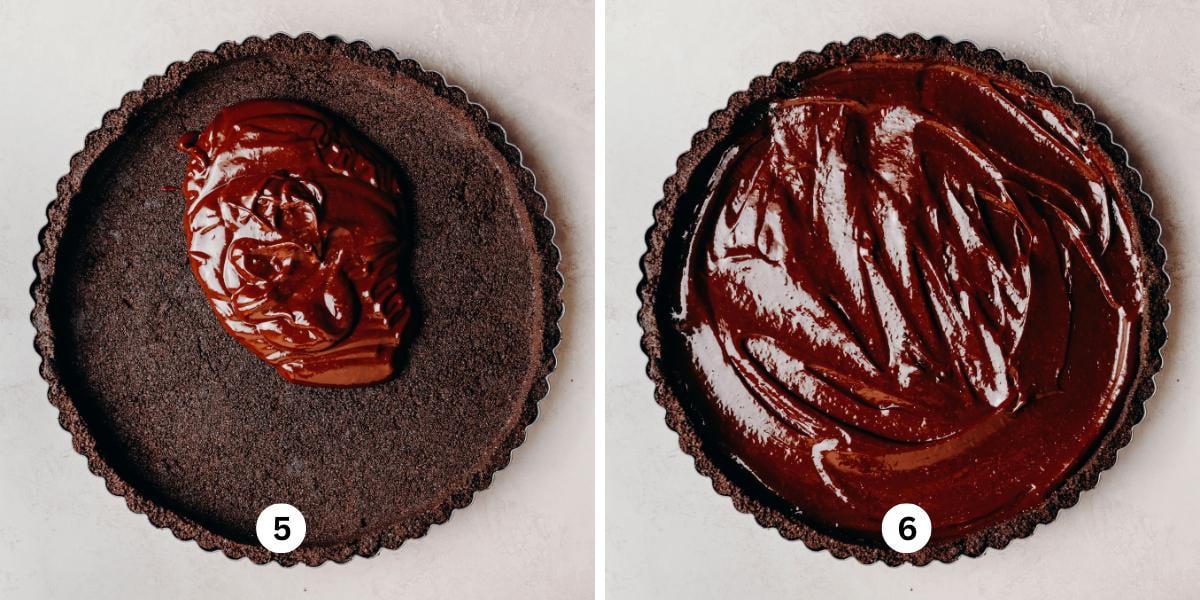Chocolate ganache poured into a chocolate cookie crust tart then spread out in an even layer on a white background.