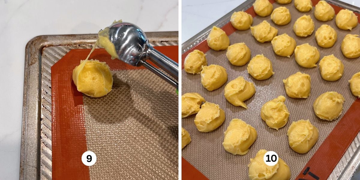 Scooping cream puff choux pastry dough onto silicone lined cookie sheet using a one tablespoon sized cookie sccop.