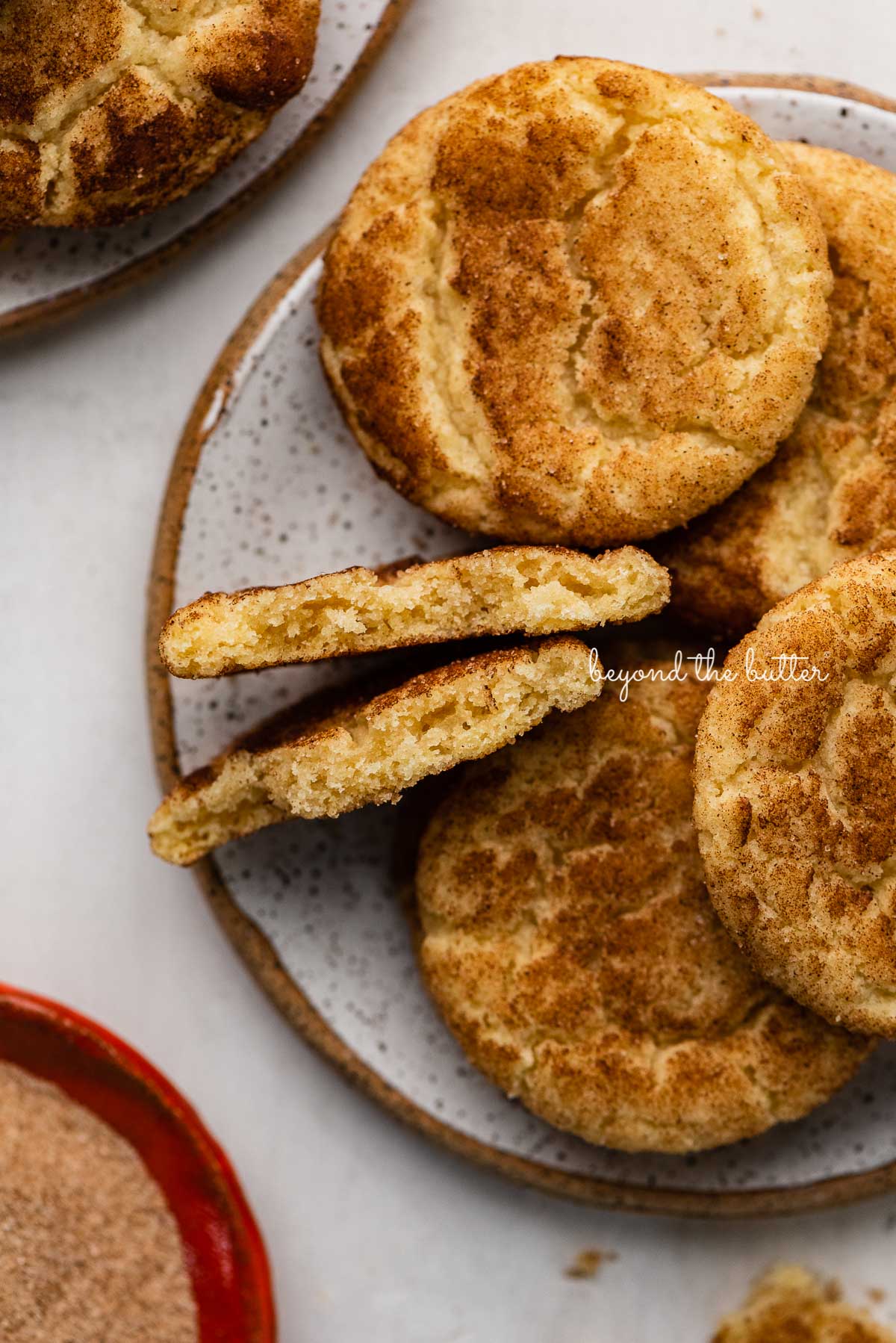 Plate of classic snickerdoodle cookies on white background | © Luyiz®