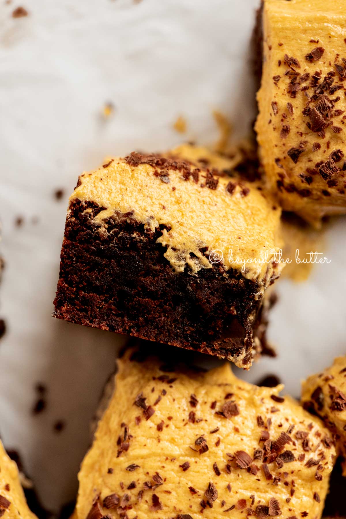 Fudgy Chocolate Brownies with Pumpkin Frosting