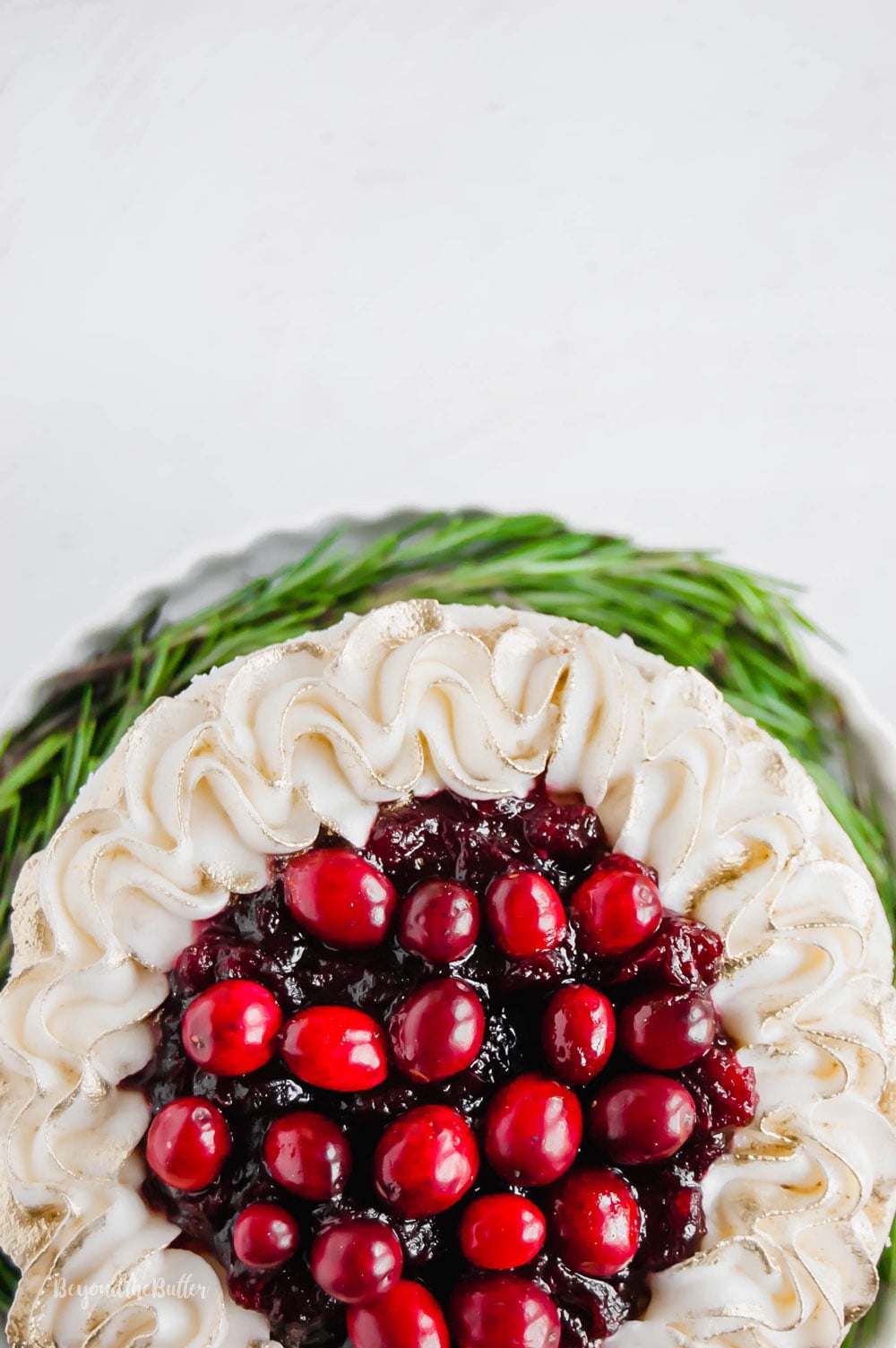 Gingerbread Cake | Overhead photo of Gingerbread Cake with Maple Buttercream Frosting and Cranberry Compote | Image Credit: Luyiz, LLC