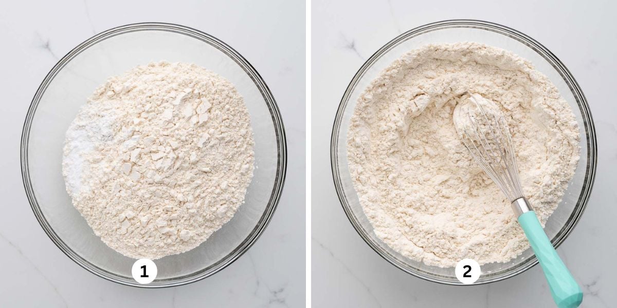 Mixing all purpose flour, baking soda, cream of tartar, and salt in a glass mixing bowl on a white marbled background.