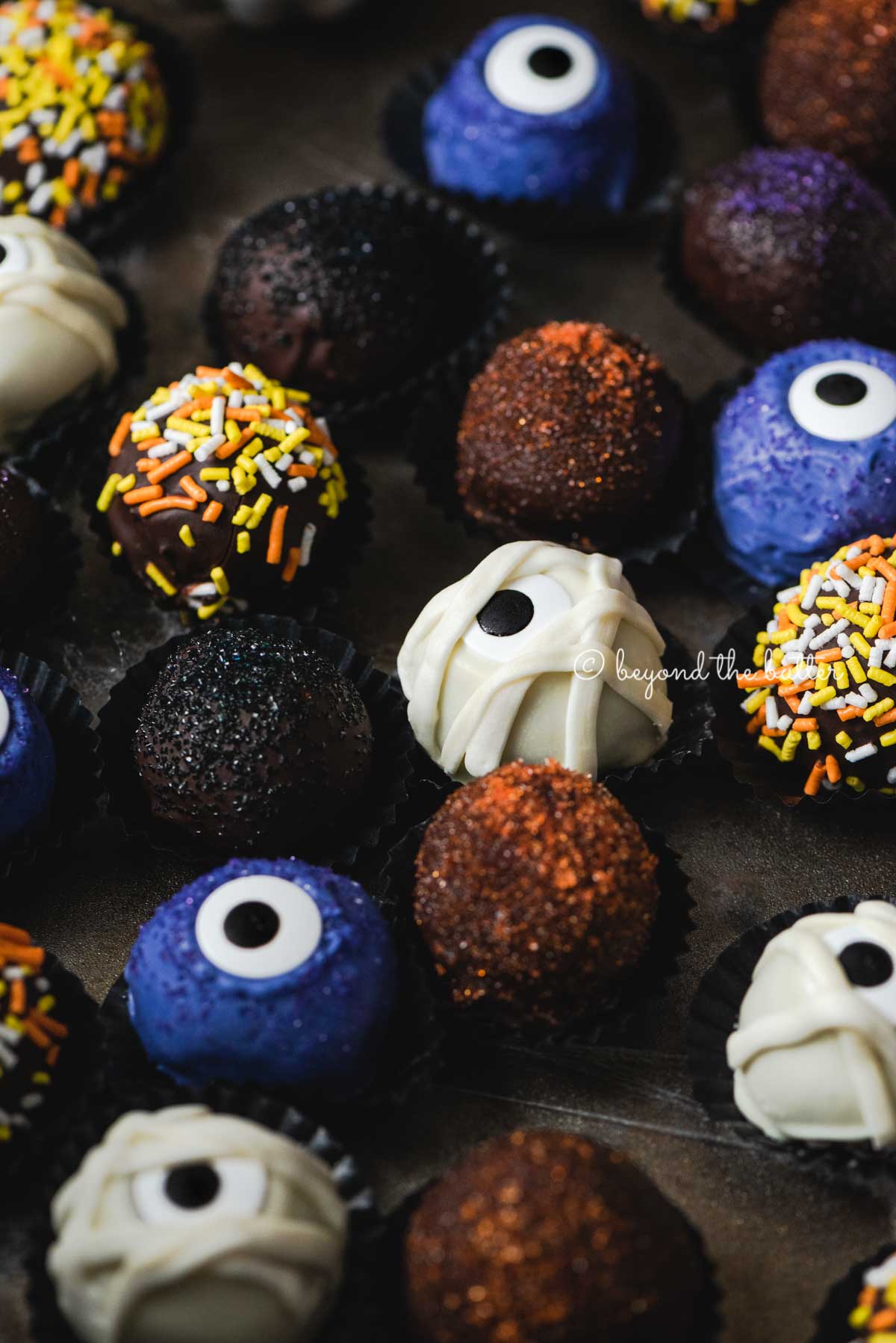 Halloween Chocolate Truffles on dark brown background | All Images © Luyiz™