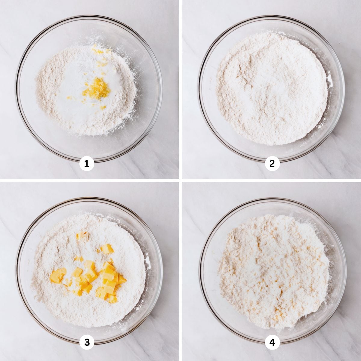 Mixing the dry ingredients together in a glass mixing bowl then adding in the cubed cold butter mixing until fully combined.