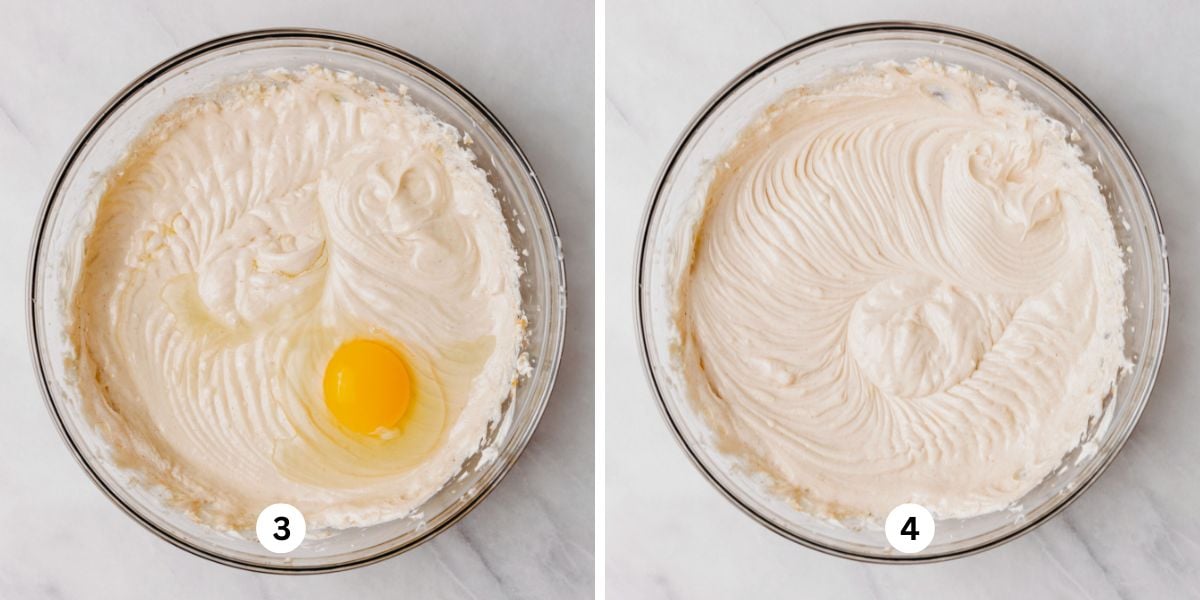 Adding eggs to cheesecake batter in a glass mixing bowl, mixing until each one is fully combined.