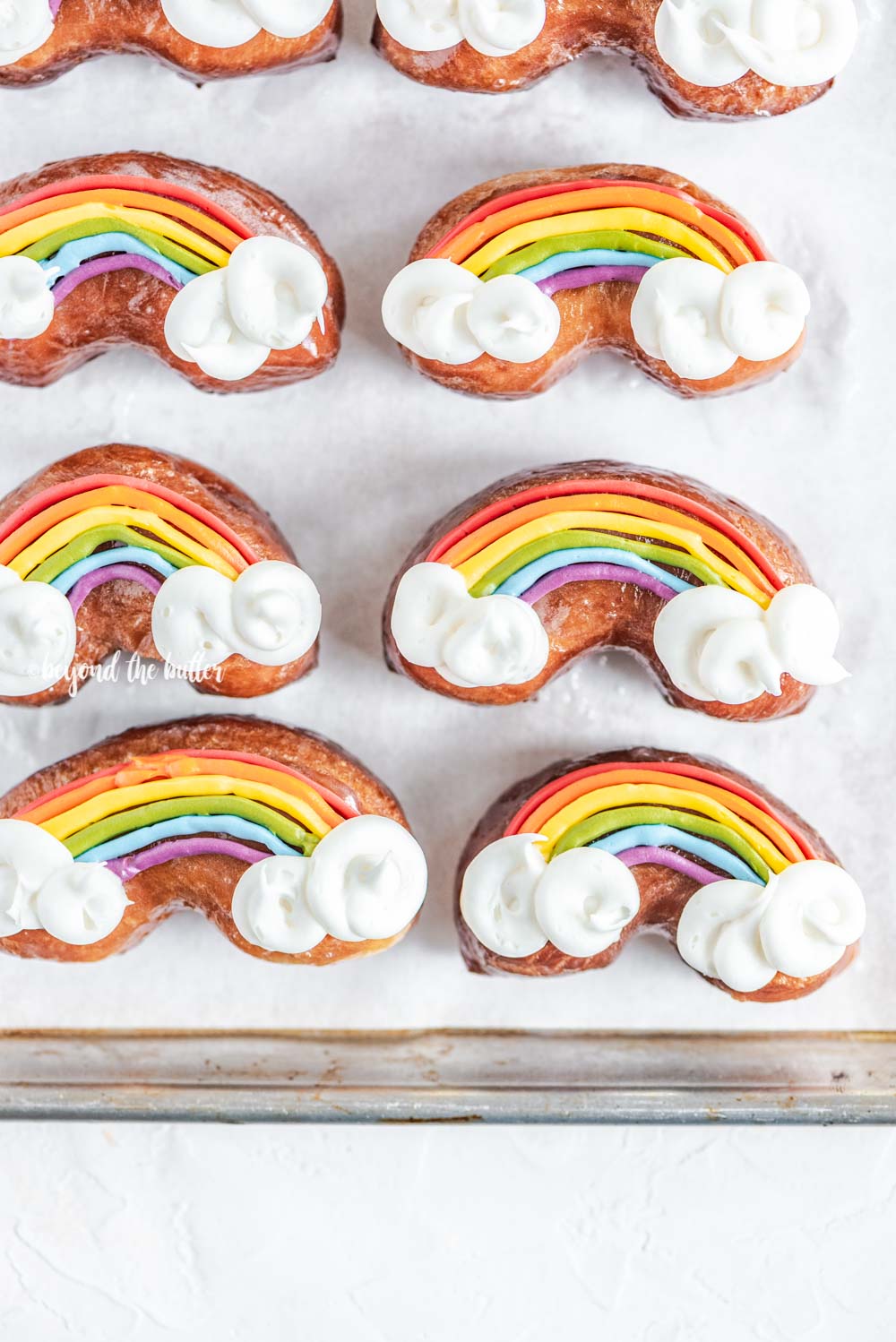 Overhead image of homemade Rainbow Donuts | All Images © Luyiz, LLC