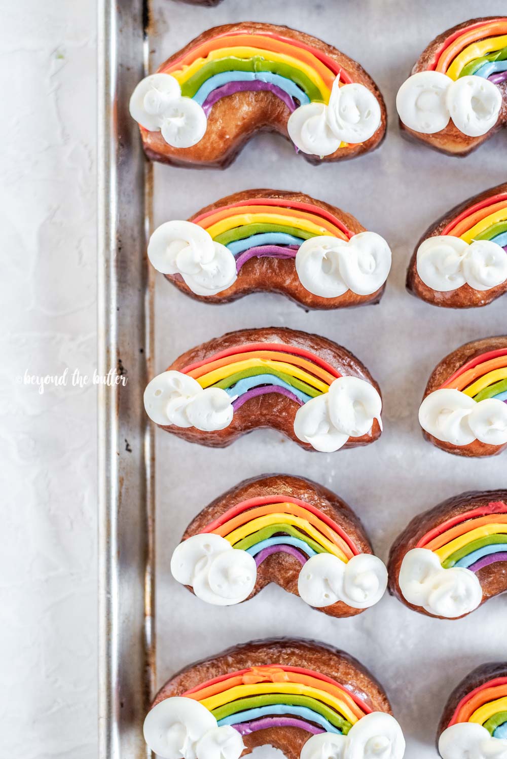 Overhead image of homemade Rainbow Donuts | All Images © Luyiz, LLC