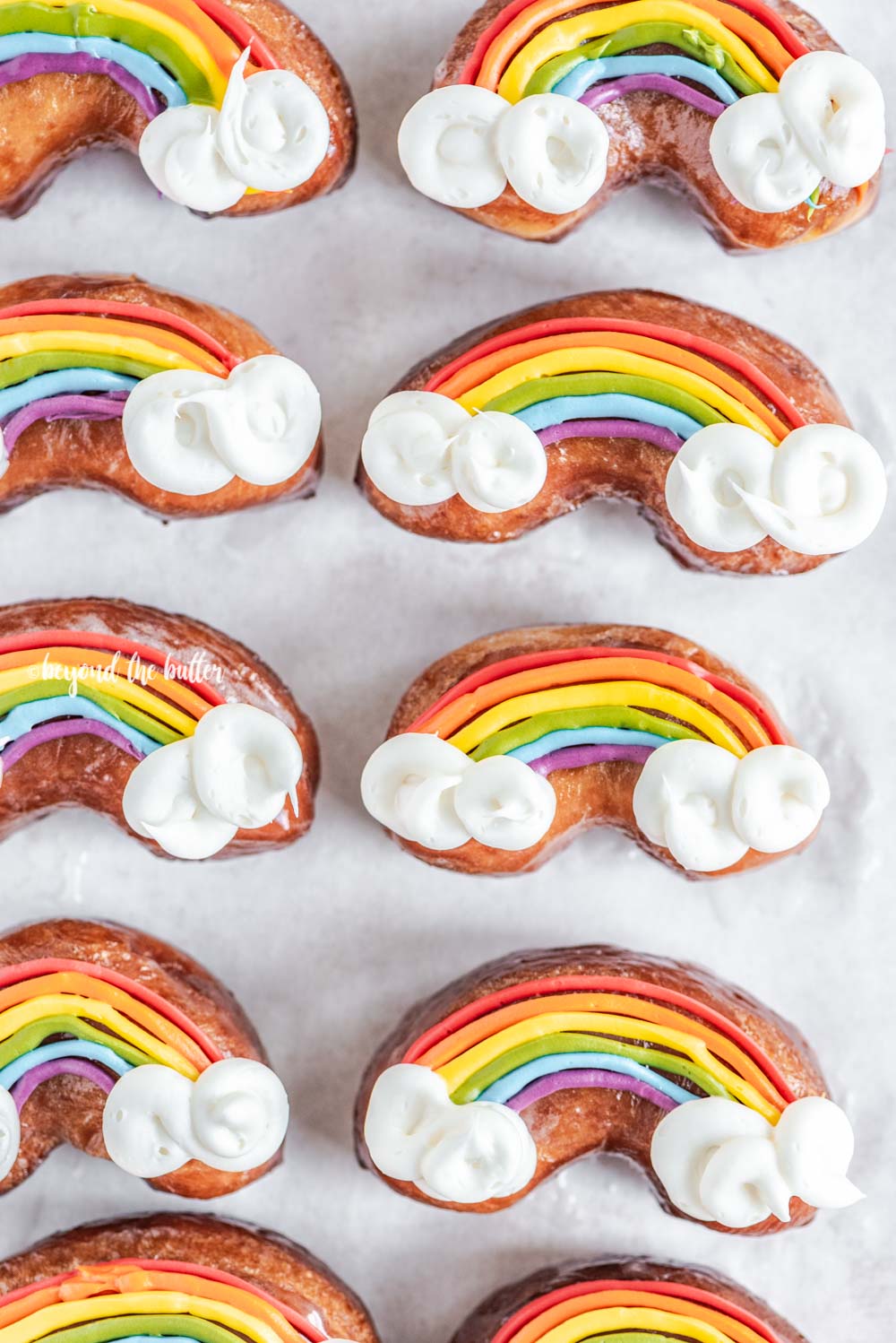 Overhead image of homemade Rainbow Donuts | All Images © Luyiz, LLC
