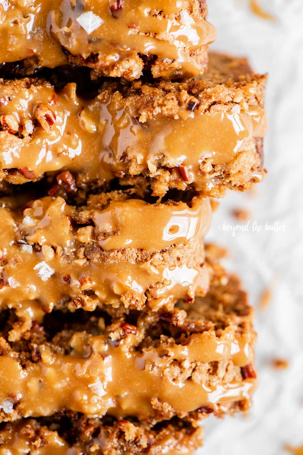Closeup overhead image of sliced salted caramel banana nut bread | All Images © Luyiz™