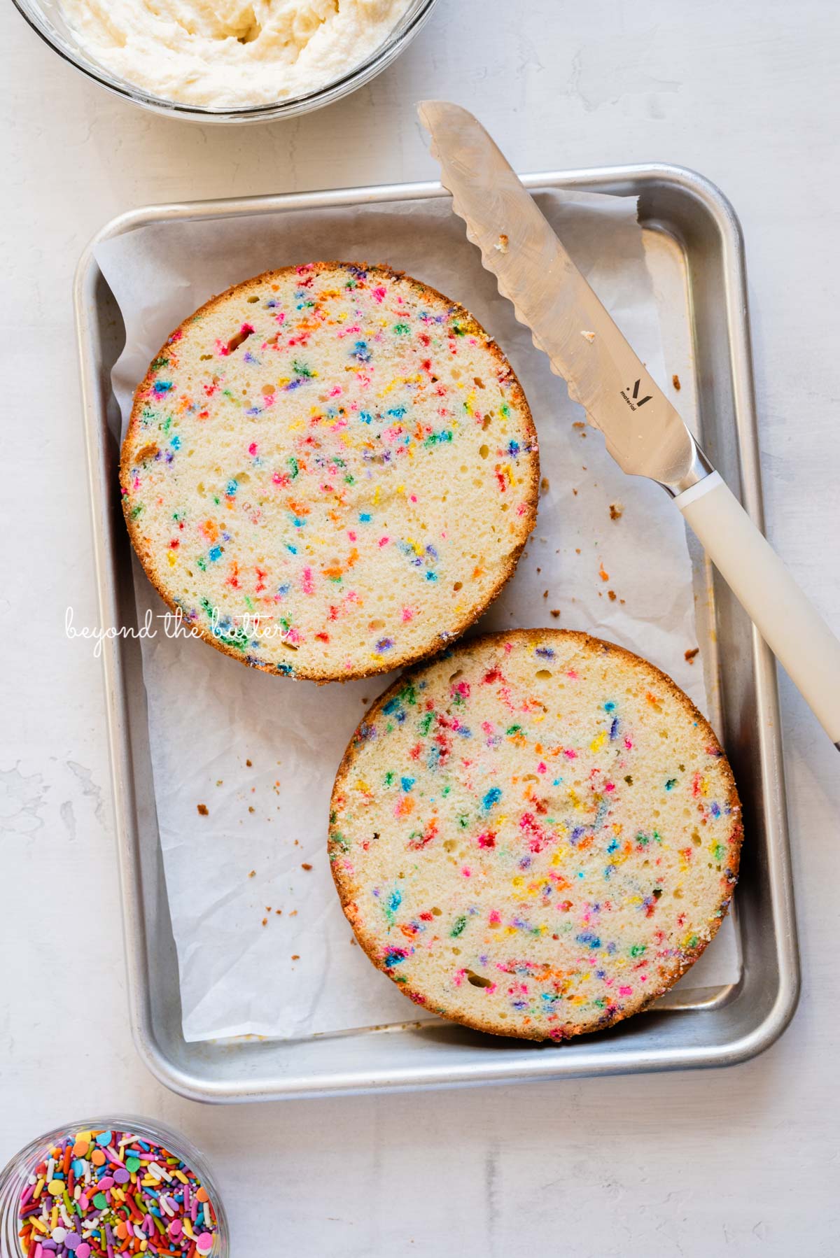 6 inch single layer funfetti cake sliced into two layers with a serrated knife from Luyiz | All images © Luyiz®