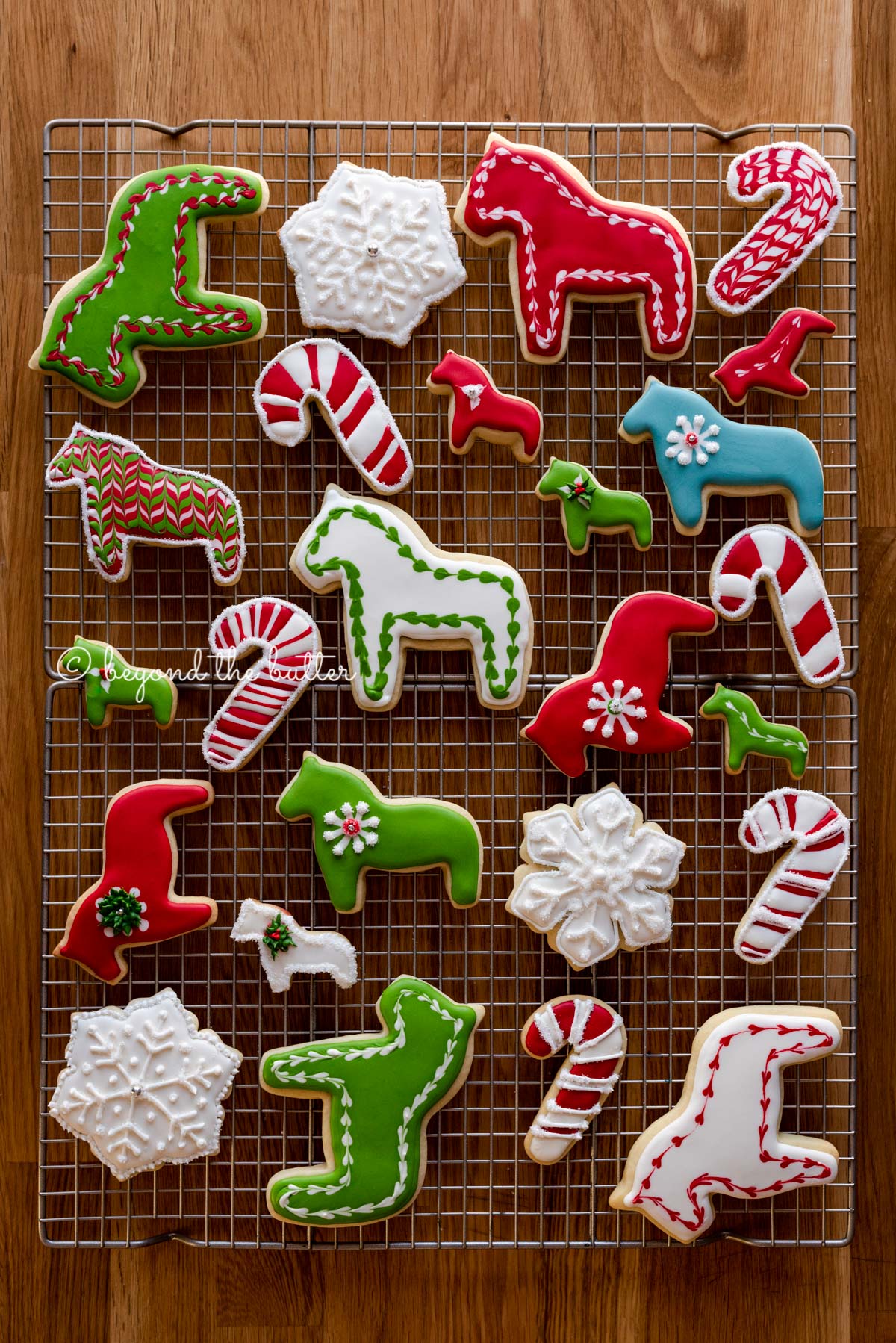 Super soft cut out sugar cookies on a wire cooling rack | All Images © Luyiz®