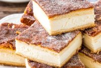 Sopapilla Cheesecake Bars Recipe — Flaky Cinnamon Sugar Bars