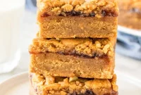 Peanut Butter and Jelly Bars Recipe — Chewy Jam-Filled Squares
