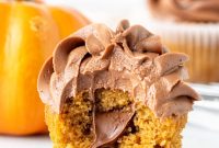 Nutella-Stuffed Pumpkin Cupcakes with Cream Cheese Frosting