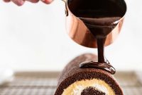 Chocolate Pumpkin Swiss Roll with Cocoa Cream Filling