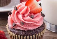 Chocolate Cupcakes Topped with Fresh Strawberry Frosting