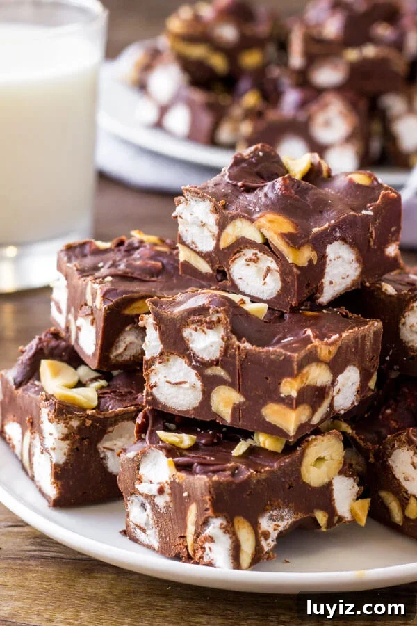 Ultimate Rocky Road Fudge Recipe: Creamy Chocolate with Nuts & Marshmallows 2 Easy Rocky Road Fudge - extra creamy chocolate with marshmallows and crunchy peanuts.
