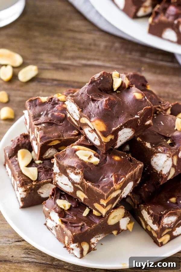 Ultimate Rocky Road Fudge Recipe: Creamy Chocolate with Nuts & Marshmallows 3 A plate of rocky road fudge - made with only 4 ingredients.