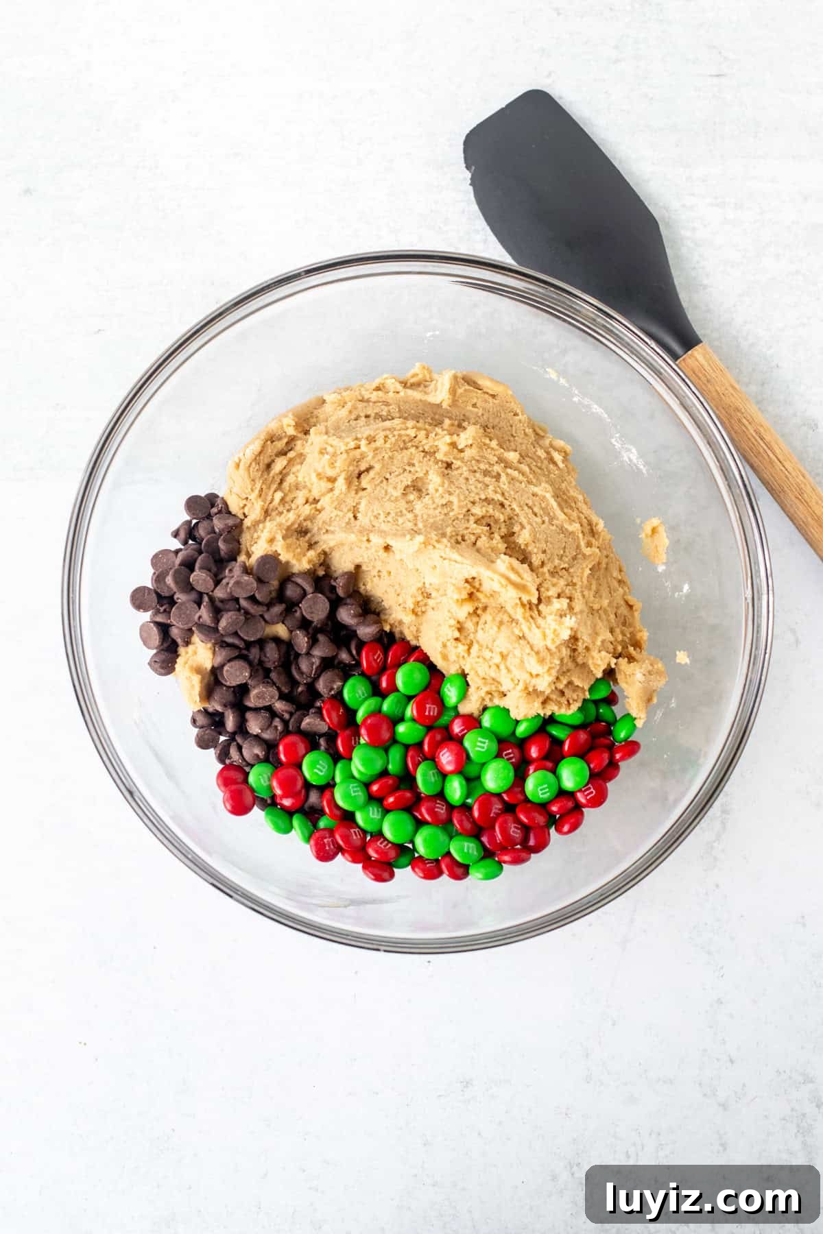 Christmas M&M Cookies: Festive Candy-Stuffed Cookie Recipe 4 Bowl of cookie dough with red and green M&Ms