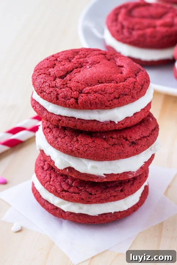 Top Red Velvet Recipes for Cakes, Cupcakes, and Desserts 5 A stack of homemade red velvet oreos made from scratch.