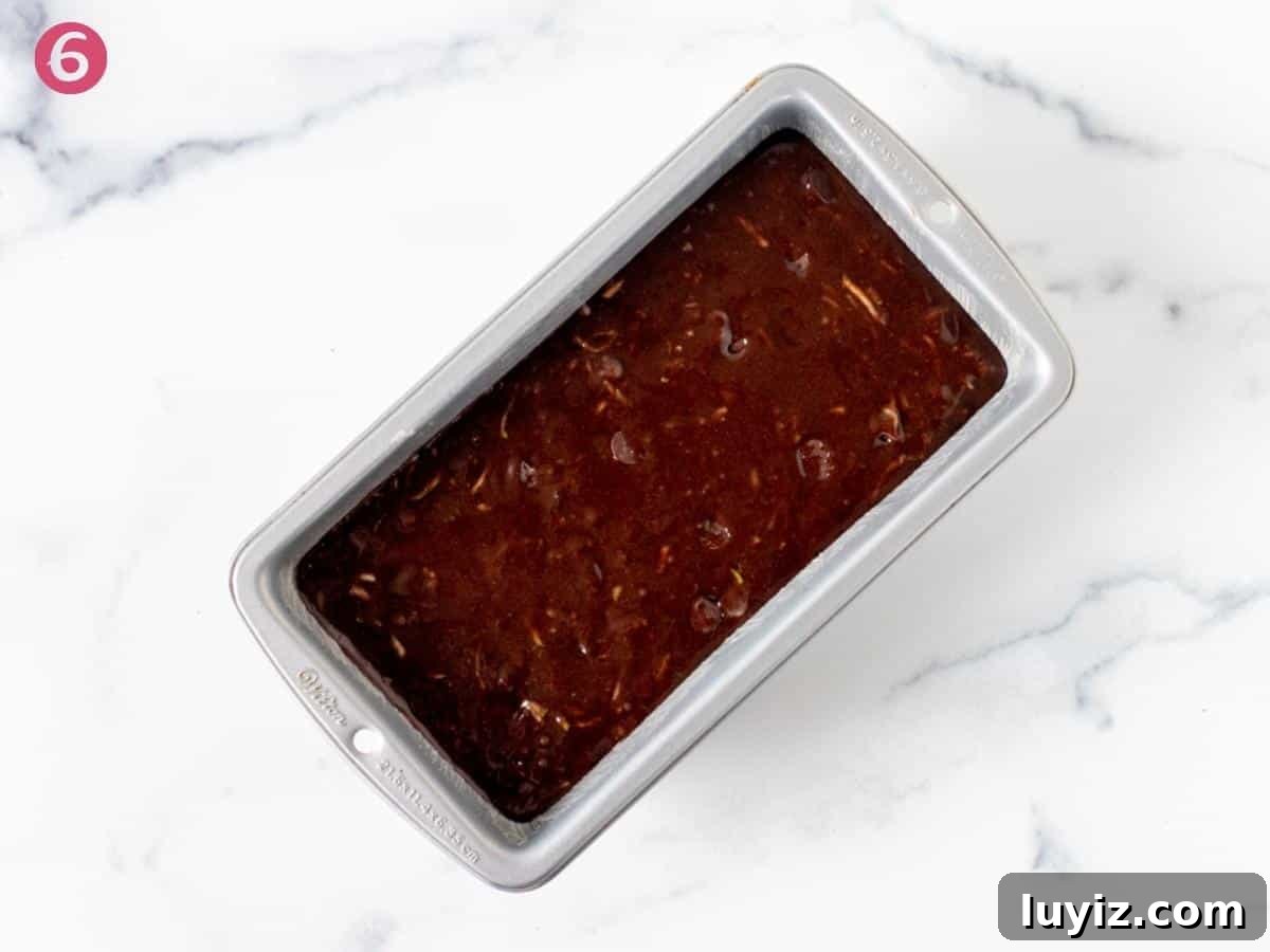 Moist Chocolate Zucchini Bread Recipe with Dark Cocoa 5 Loaf pan of unbaked chocolate zucchini bread