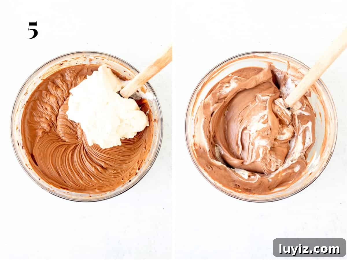 Creamy No-Bake Chocolate Cheesecake Recipe 7 Bowl of no bake chocolate cheesecake batter, folding the whipped cream into the batter