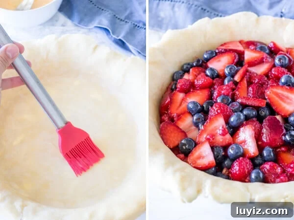 Mixed Berry Pie Recipe: Homemade Rustic Summer Fruit Tart 4 How to make mixed berry pie. 1st photo showing how to brush the egg wash on the bottom pie crust. 2nd photo showing the berry filling spooned into the bottom pie crust.