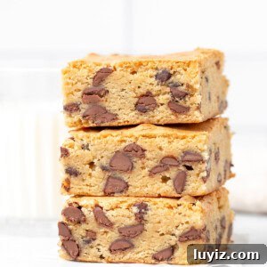 Chewy Chocolate Chip Cookie Bars Recipe for Perfect Dessert 7 Three chocolate chip cookie bars, one on top of each other