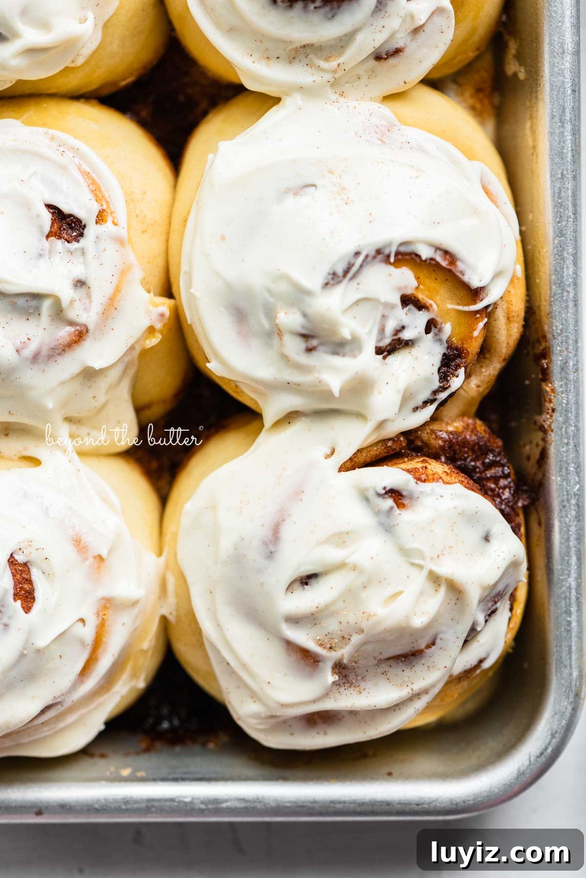 Small-Batch Cinnamon Rolls Recipe for Two to Four People 2 Just frosted small batch cinnamon rolls from BeyondtheButter.com | © Beyond the Butter®