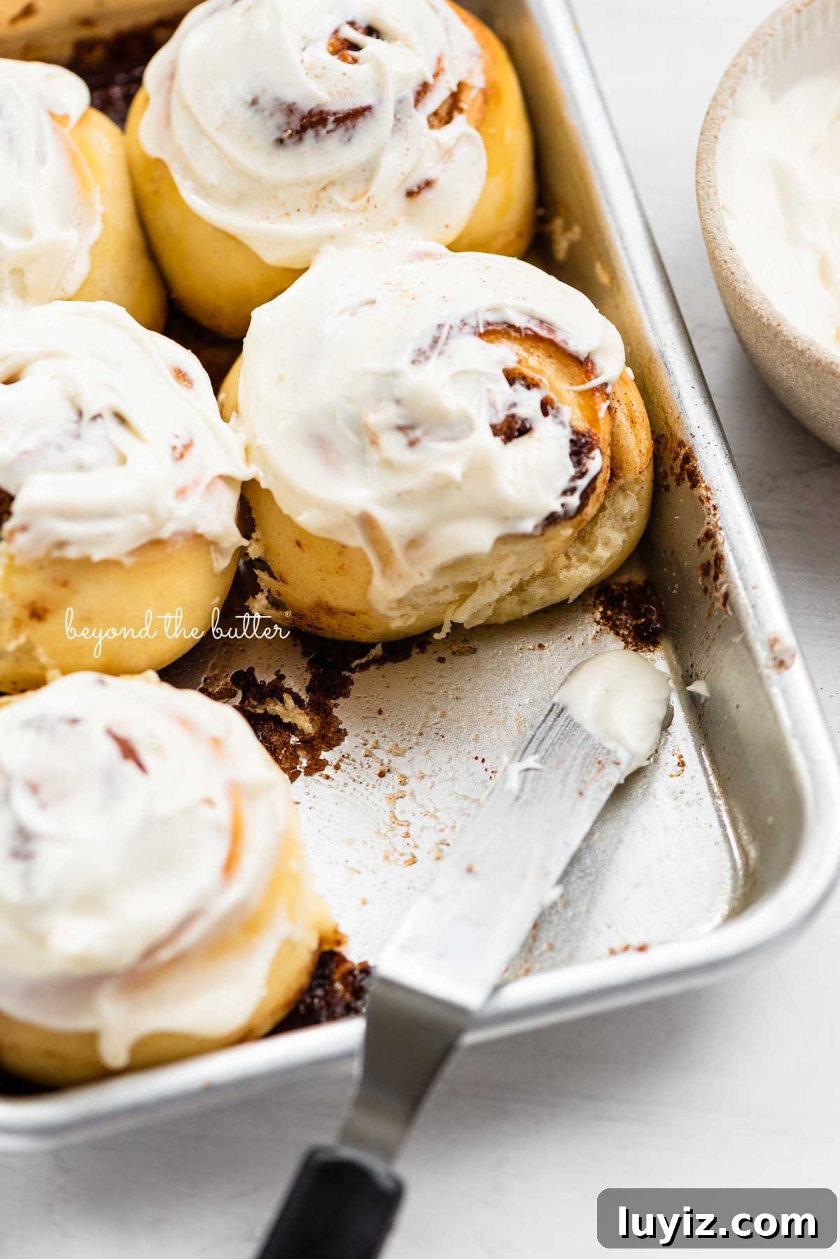 Small-Batch Cinnamon Rolls Recipe for Two to Four People 6 Just frosted small batch cinnamon rolls from BeyondtheButter.com | © Beyond the Butter®