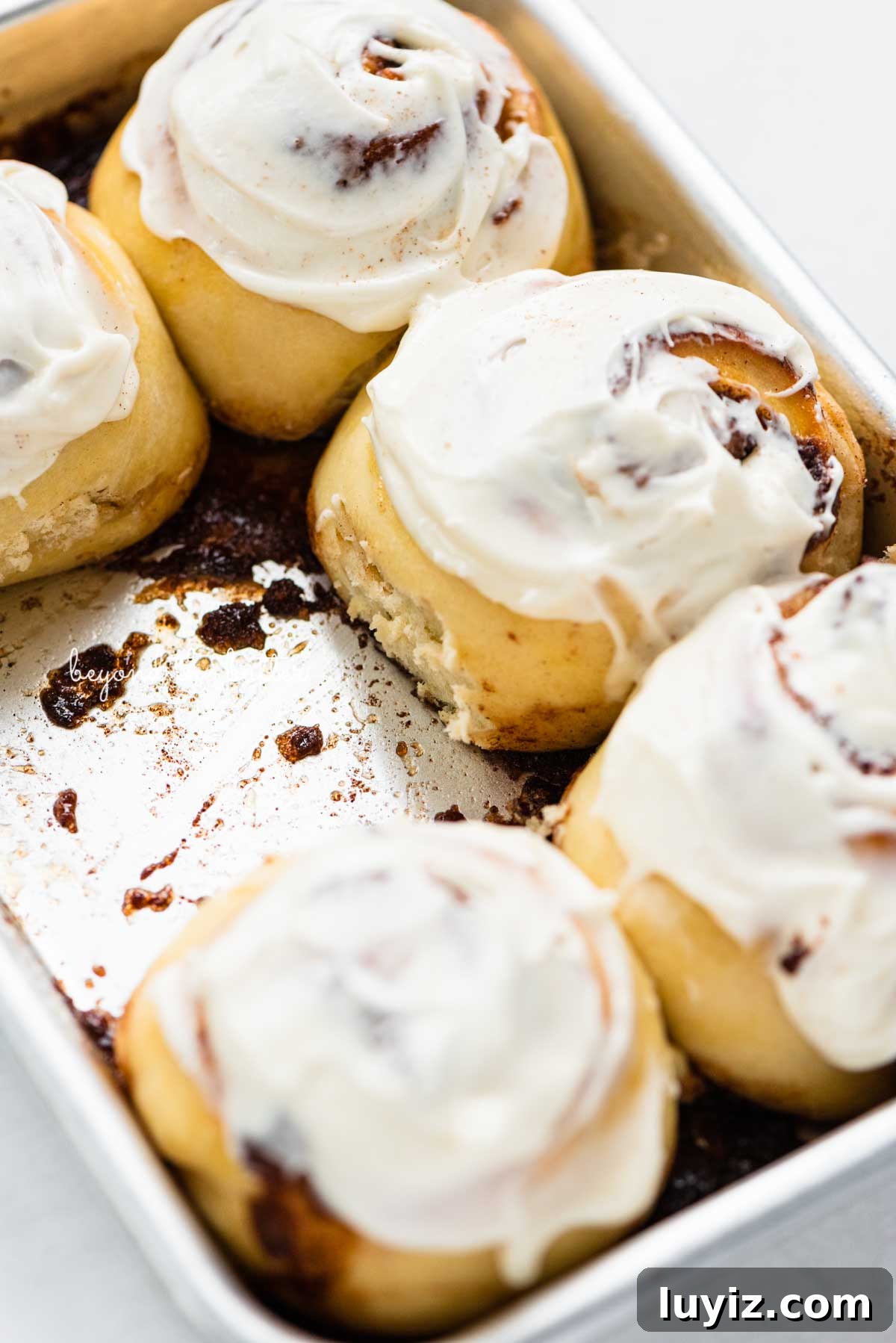 Small-Batch Cinnamon Rolls Recipe for Two to Four People 7 Just frosted small batch cinnamon rolls from BeyondtheButter.com | © Beyond the Butter®