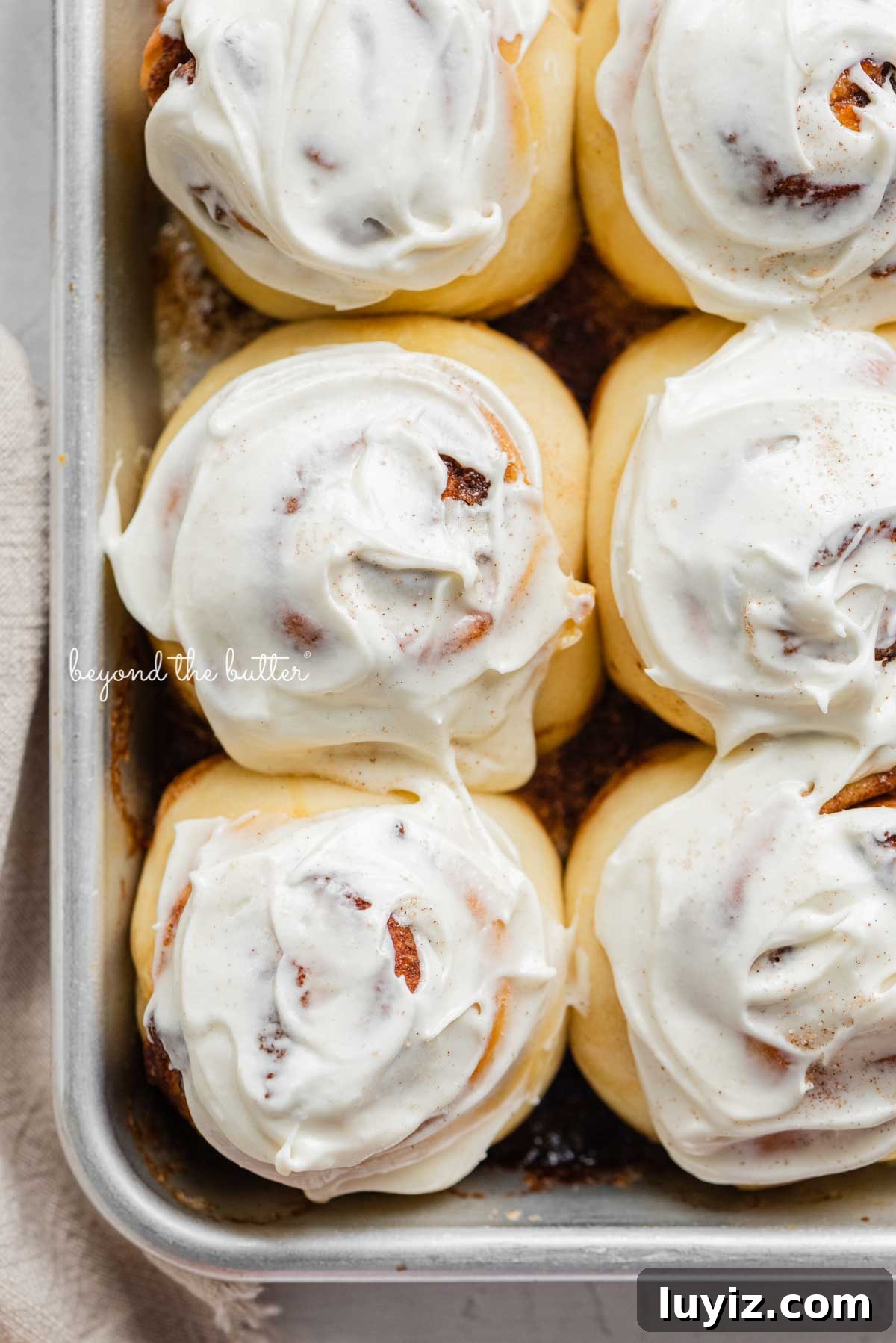 Small-Batch Cinnamon Rolls Recipe for Two to Four People 8 Just frosted small batch cinnamon rolls from BeyondtheButter.com | © Beyond the Butter®