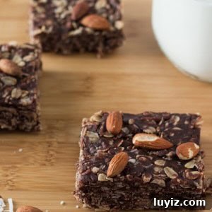 Almond Joy Granola Bars Recipe — Coconut, Almond & Chocolate Bars 5 Almonds, coconut & chocolate come together in these delicious Almond Joy Granola Bars. Wholesome ingredients, gluten-free, vegan, super easy and totally addictive!