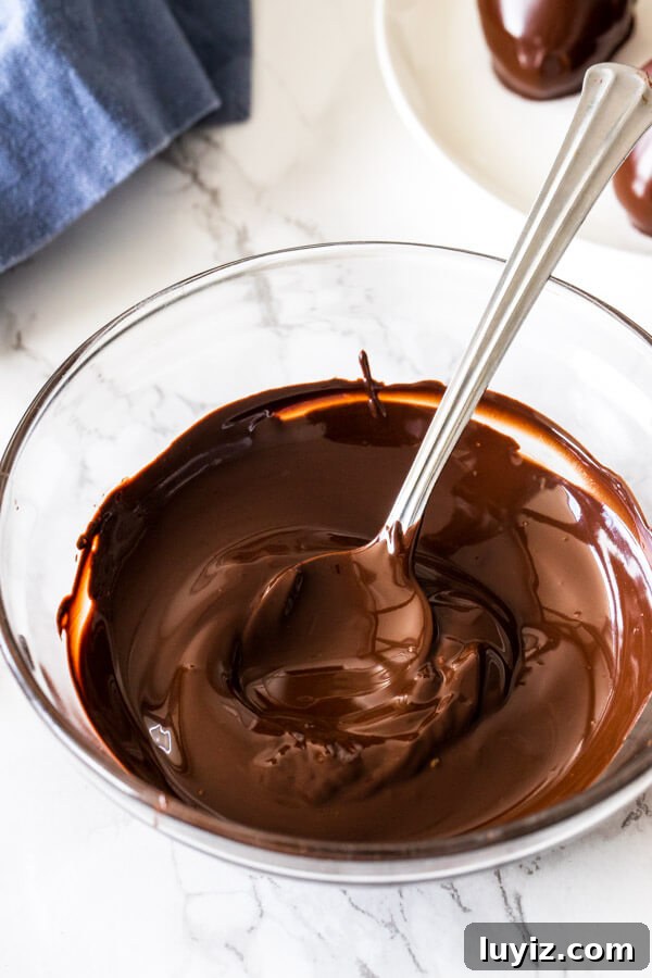 Perfect Chocolate Melting Guide: Techniques for Smooth, Shiny Melted Chocolate 5 Melted chocolate in a glass bowl