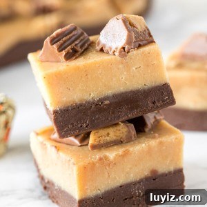 Chocolate Peanut Butter Fudge (Buckeye Fudge) Recipe 5 2 pieces of layered chocolate peanut butter fudge stacked on top of each other