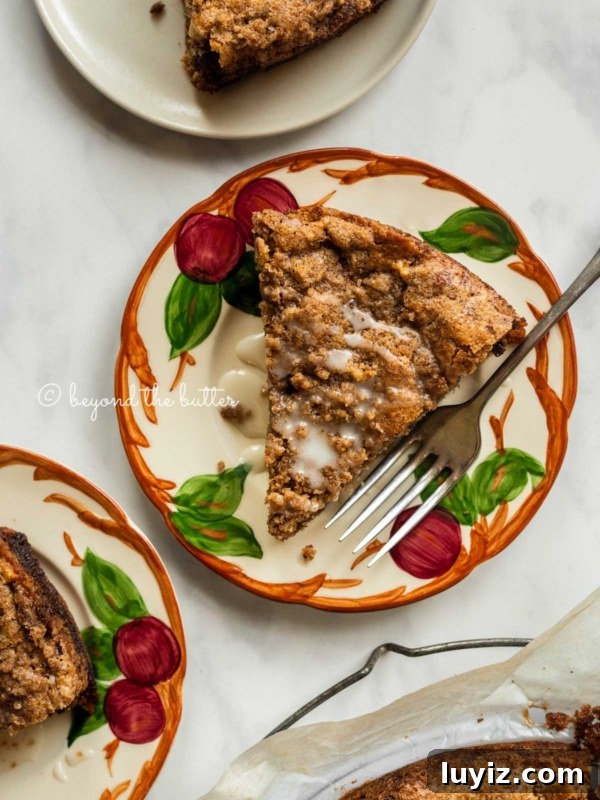 Moist Apple Bundt Cake with Cinnamon Glaze 12 Slices of warm apple coffee cake on dessert plates drizzled with a simple vanilla glaze.