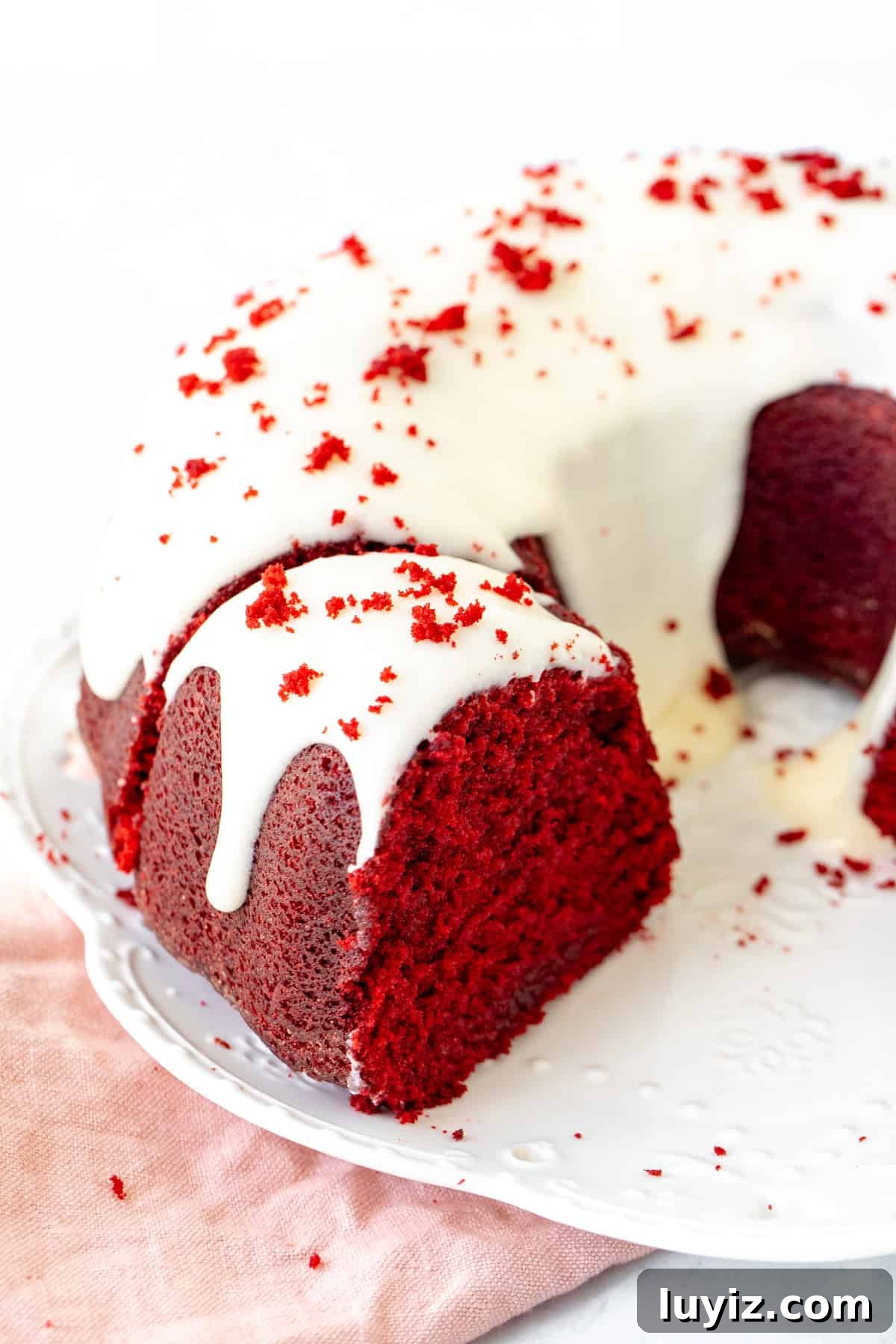 Moist Red Velvet Bundt Cake Recipe with Cream Cheese Glaze 10 Red velvet bundt cake with slices cut