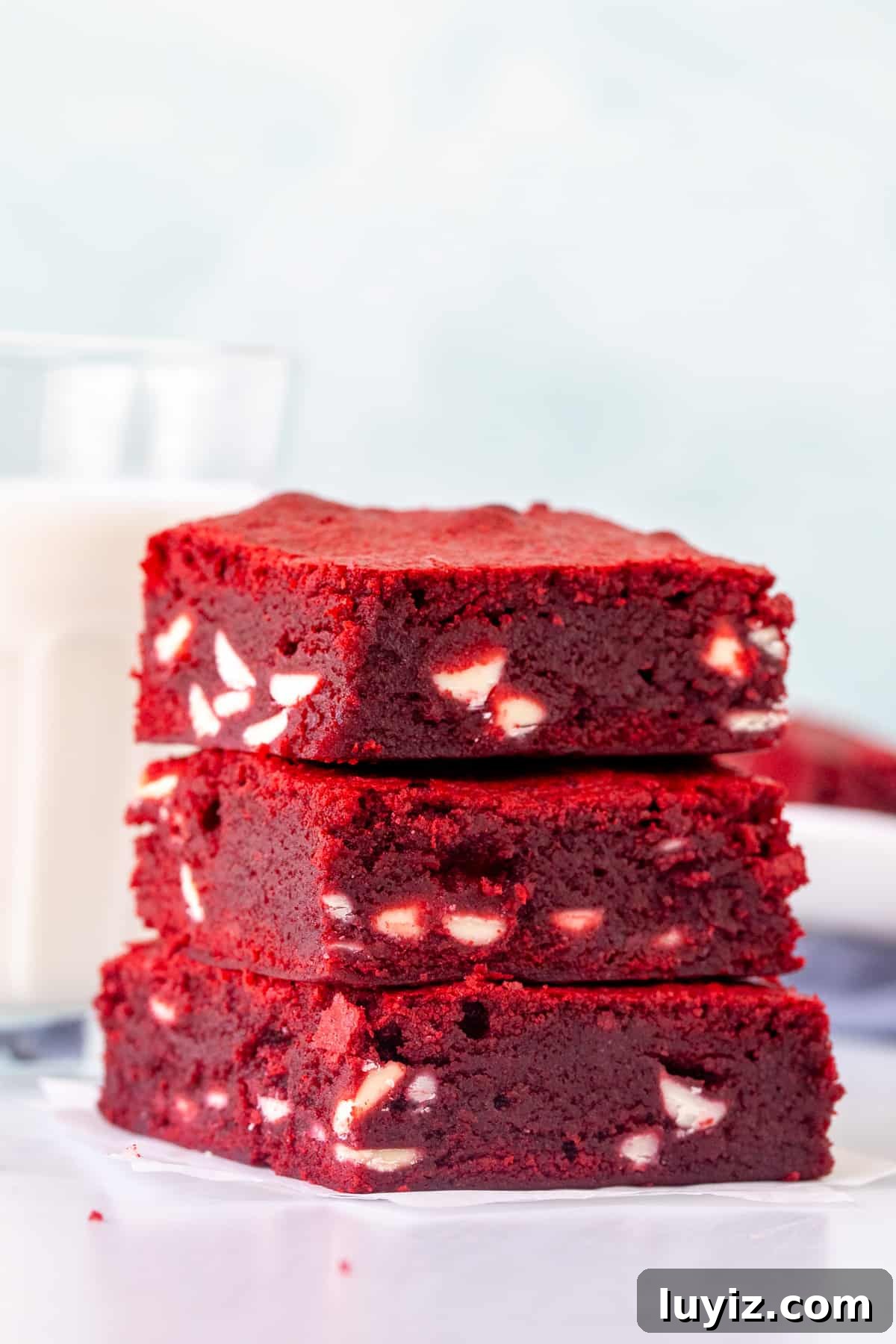 Red Velvet Brownies Recipe: Decadent Chocolate-Cream Cheese Bars 6 Stack of 3 red velvet brownies, one on top of each other