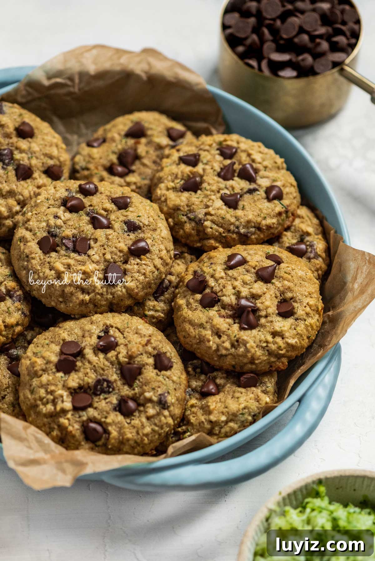 Moist Zucchini Chocolate Chip Oatmeal Cookies Recipe 7 Baked zucchini chocolate chip oatmeal cookies in a blue serving dish
