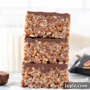 Chewy Mars Bar Squares Recipe with Chocolate Caramel Layer 7 Stack of three Mars Bar Slice squares, one on top of another