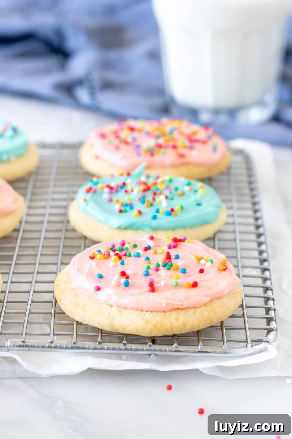 Soft-Batch Sour Cream Sugar Cookies — Ultra-Soft, Tender Cookies 2 Sour cream sugar cookies on a wire rack
