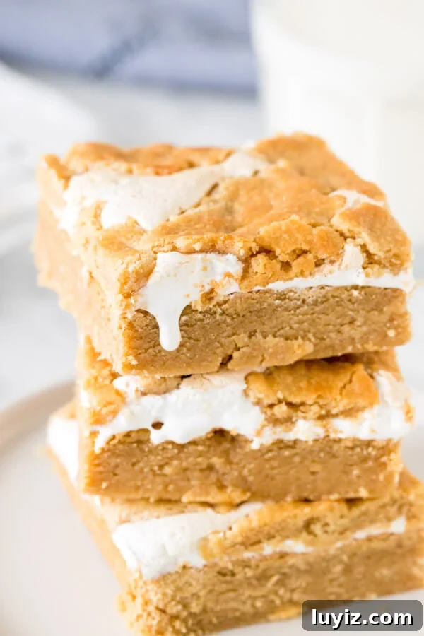 Fluffernutter Bars Recipe: Classic Peanut Butter & Marshmallow Squares 2 Stack of 3 fluffernutter bars,