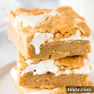 Stack of 3 gooey fluffernutter bars.