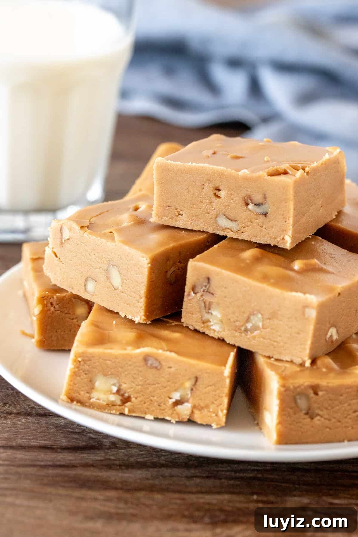 Irresistible Brown Sugar Fudge Recipe: Soft, Chewy Squares 4 Squares of fudge on a plate.