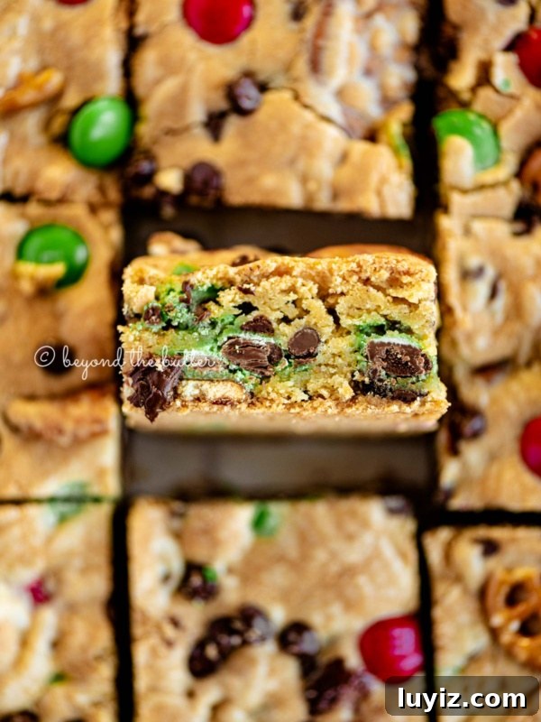 7-Layer Magic Cookie Bars Recipe (Classic Dessert Bars) 13 Holiday chocolate chip cookie bars cut into squares.