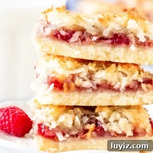 Raspberry Coconut Bars Recipe: Chewy Fruit-Filled Dessert Bars 7 Stack of 3 raspberry coconut bars