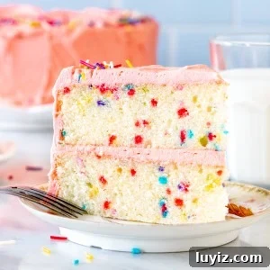 Scratch-Made Funfetti Cake Filled with Rainbow Sprinkles 7 Slice of homemade funfetti cake