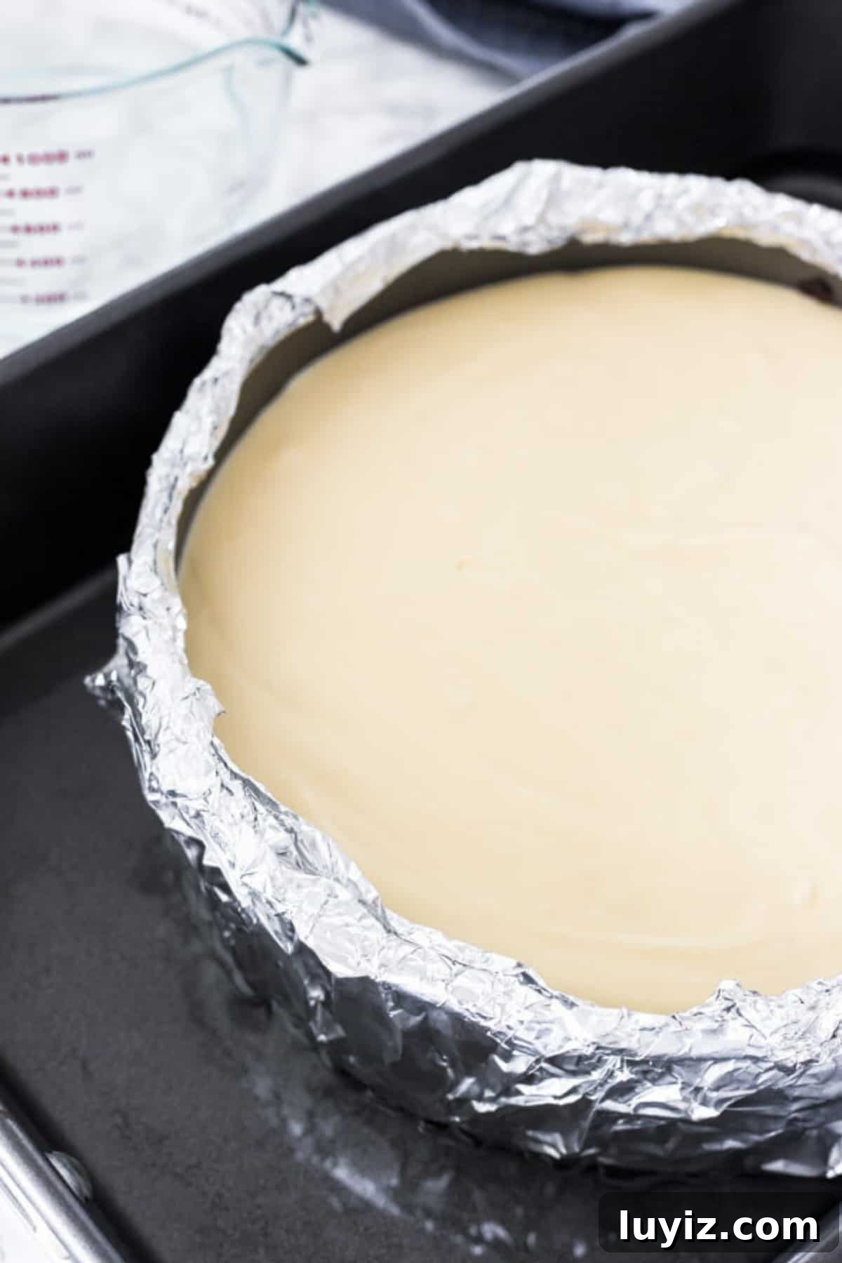 Decadent Strawberry Cheesecake Recipe with Fresh Strawberry Glaze 4 Unbaked cheesecake in a waterbath
